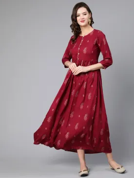 Women Burgundy Printed Flared Dress With Three Quarter Sleeves