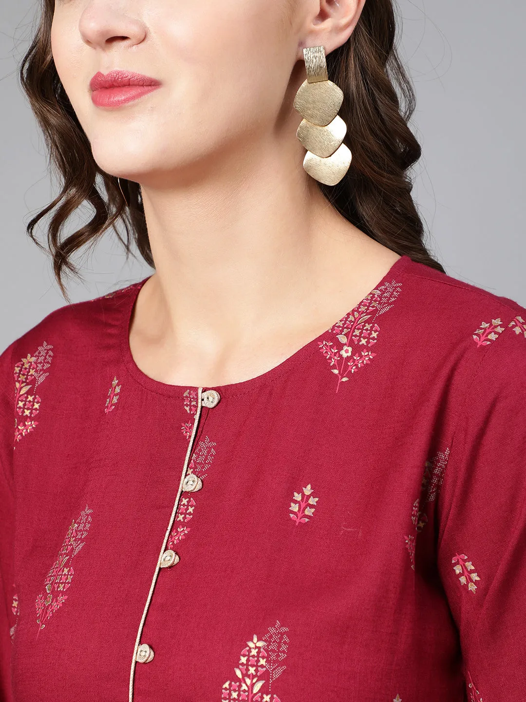 Women Burgundy Printed Flared Dress With Three Quarter Sleeves