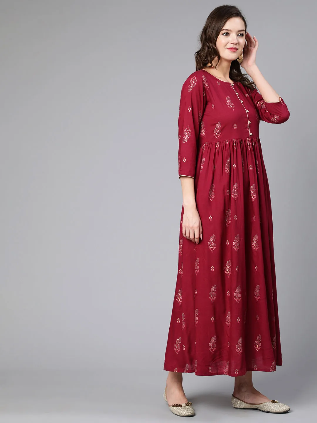 Women Burgundy Printed Flared Dress With Three Quarter Sleeves